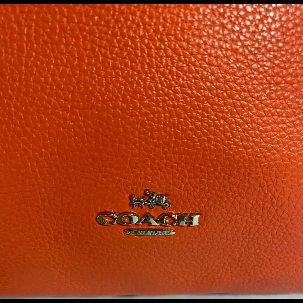 Coach coral leather